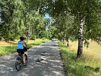 EBI 2023 Mirek 093  Po dosti rozbité silnici (Daniela). – pondělí, 24. července